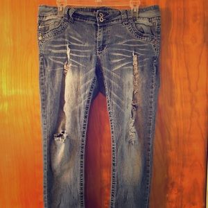 Skinny leg distressed stretch jeans